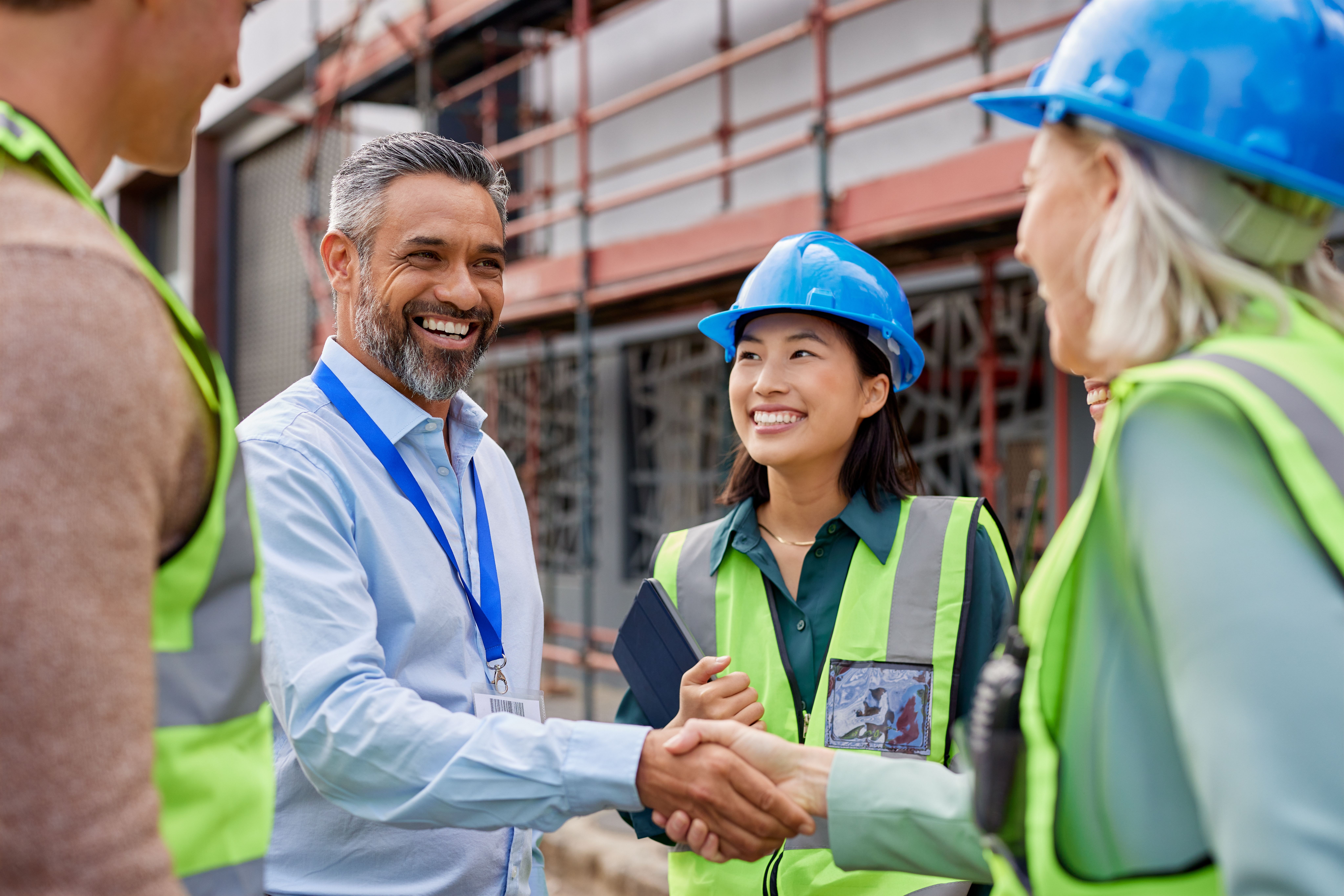 facilities-procurement-manager-meeting-contractors-on-construction-site.jpeg